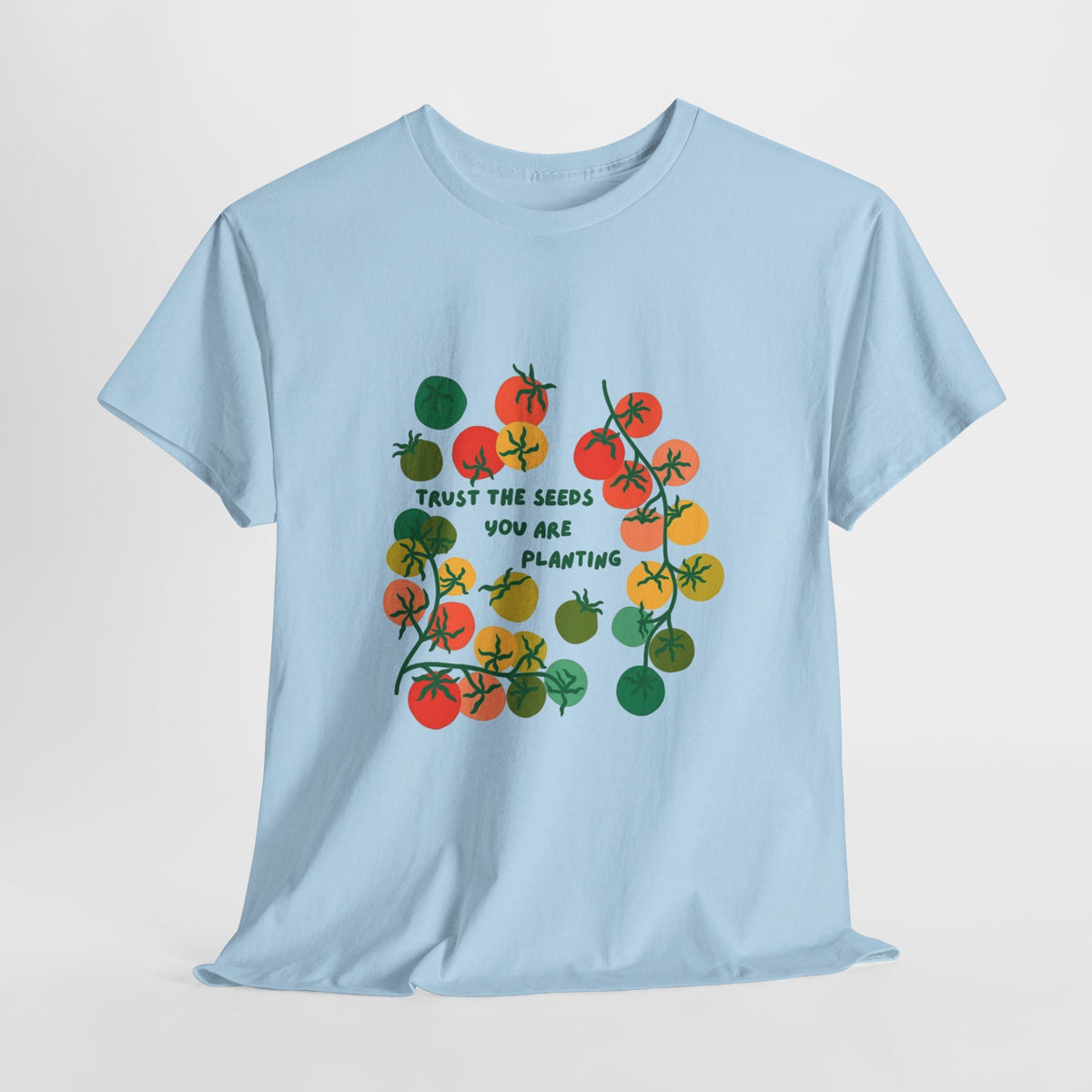 Gardening quote t-shirt with hand-drawn leaves and 'Trust the seeds you are planting'