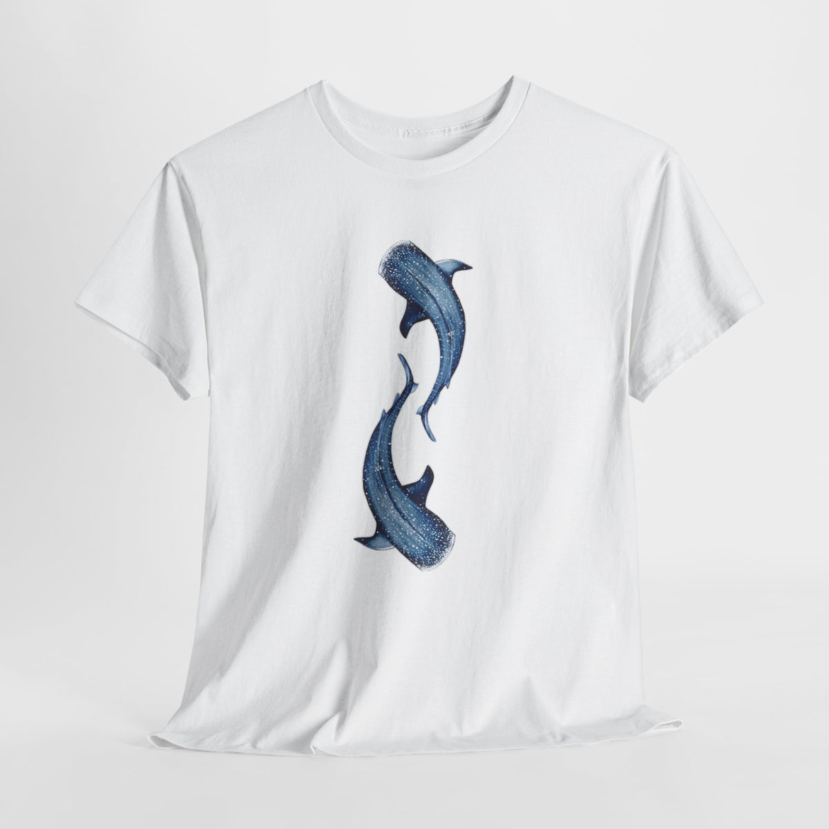 Whale t-shirt with two blue watercolor whales arcing toward each other
