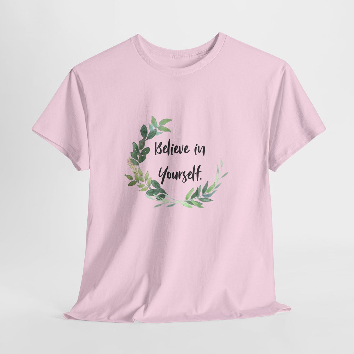 Inspirational t-shirt with 'Believe in Yourself' inside a watercolor leaf wreath