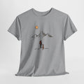 Mountain t-shirt with a line drawing of a hiker and dog below peaks and a sun