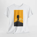 Mountain t-shirt with a lone hiker silhouetted against a golden sky and peaks
