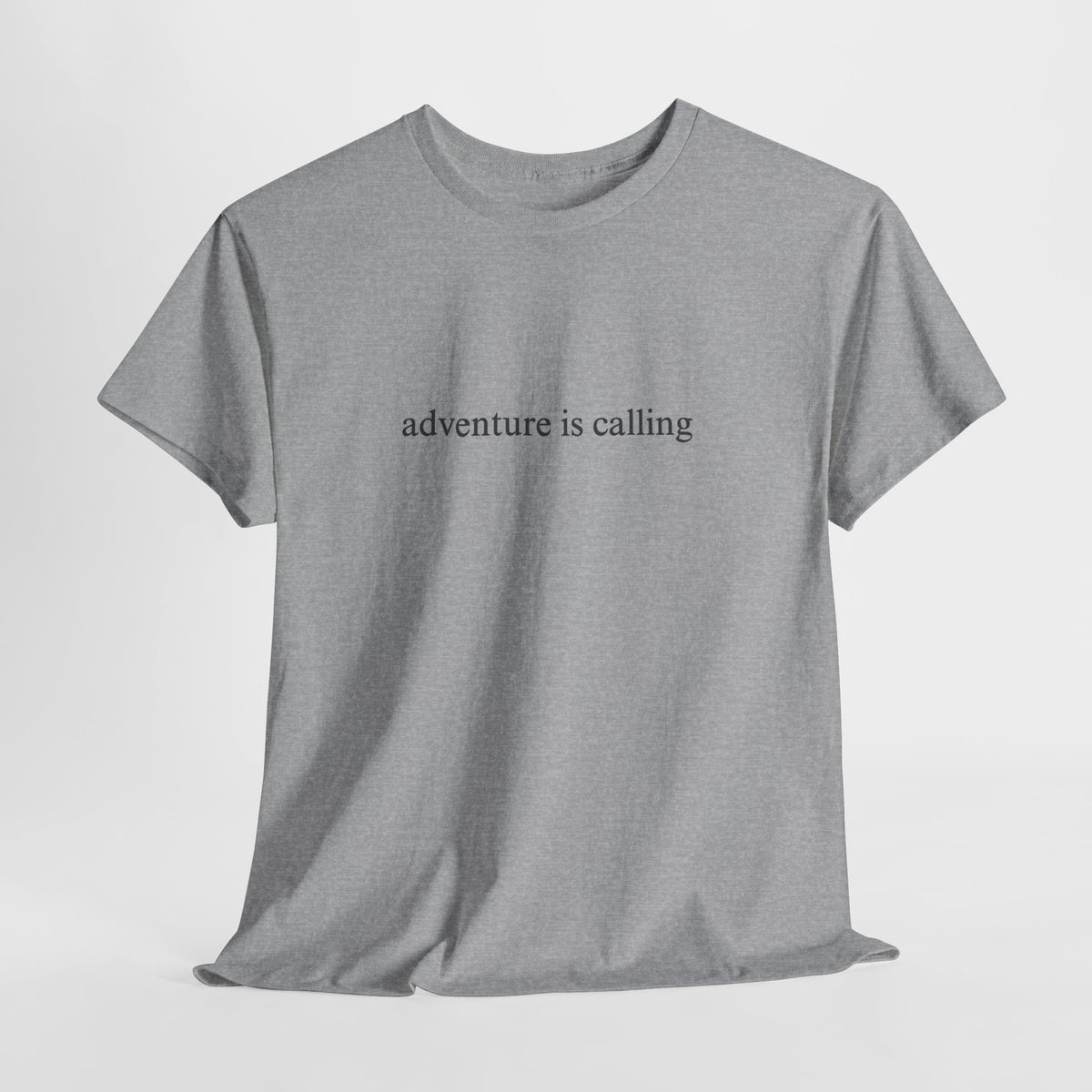 Minimalist t-shirt with a small 'adventure is calling' print on the chest