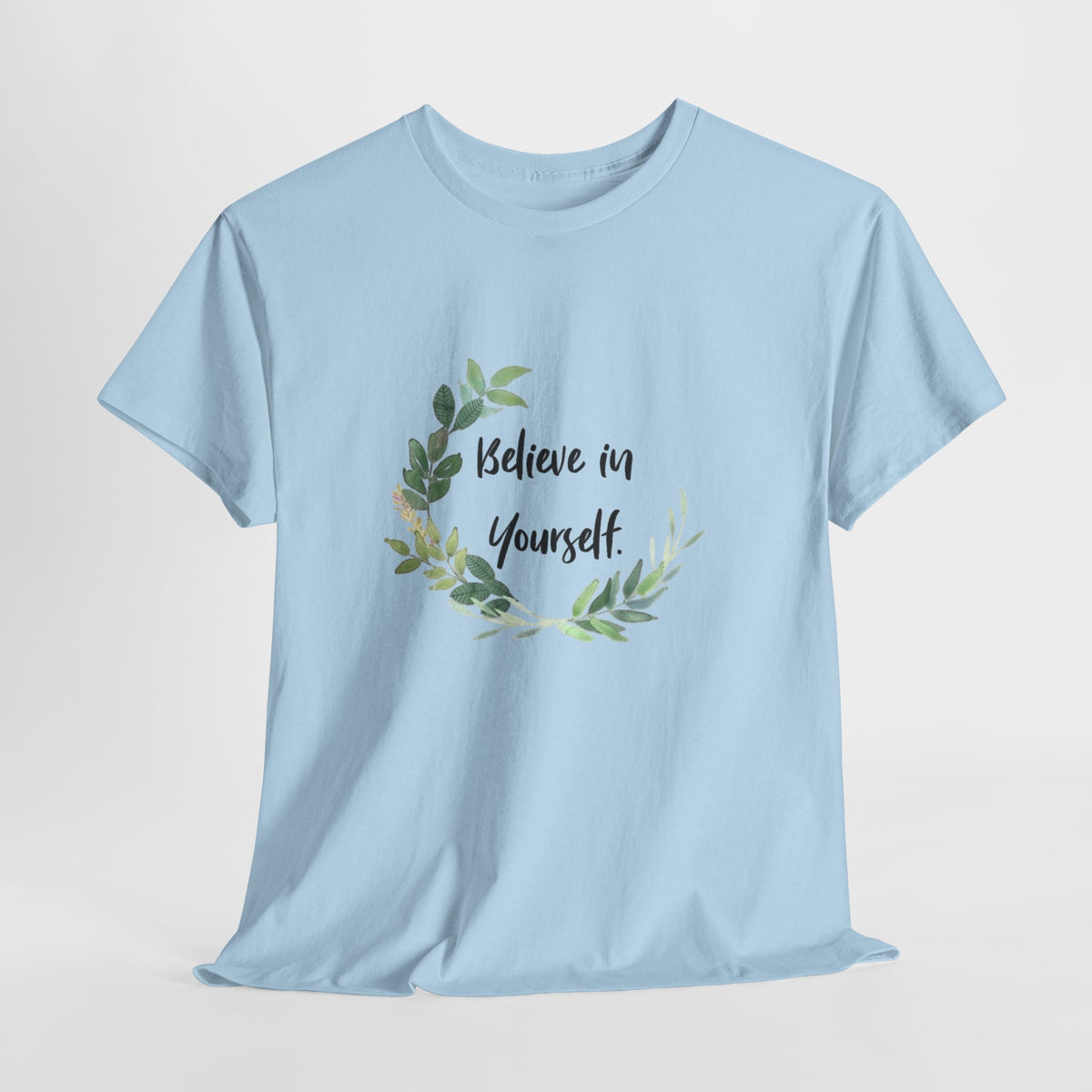 Inspirational t-shirt with 'Believe in Yourself' inside a watercolor leaf wreath