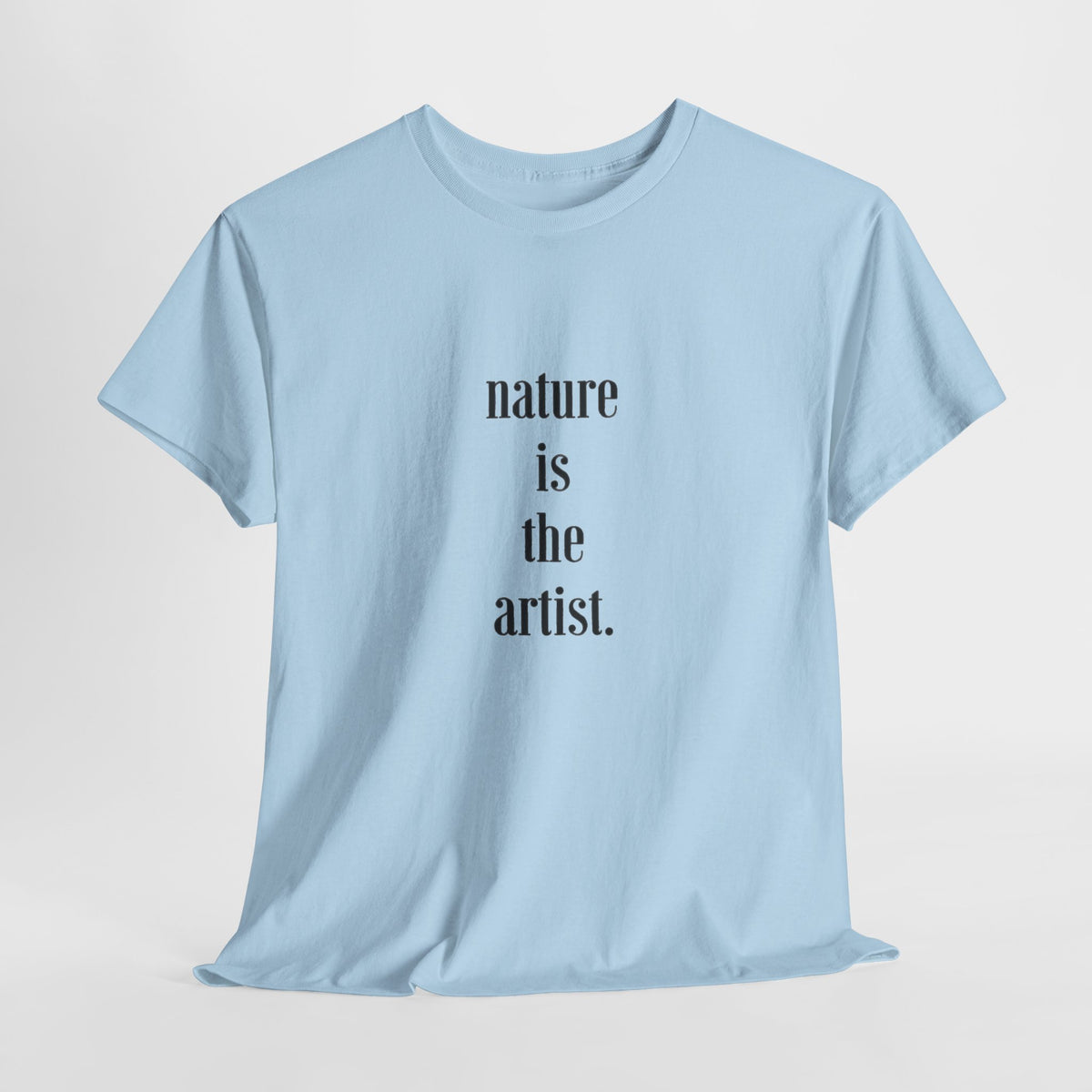 Nature quote t-shirt reading 'nature is the artist' in serif type