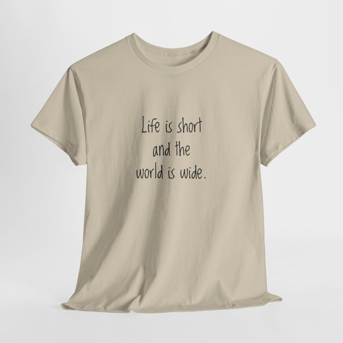 Travel quote t-shirt reading 'Life is short and the world is wide' in handwritten type