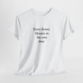 Quote t-shirt reading 'Every flower blooms in his own time' in serif text