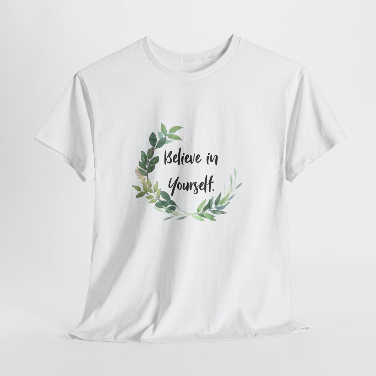 Inspirational t-shirt with 'Believe in Yourself' inside a watercolor leaf wreath
