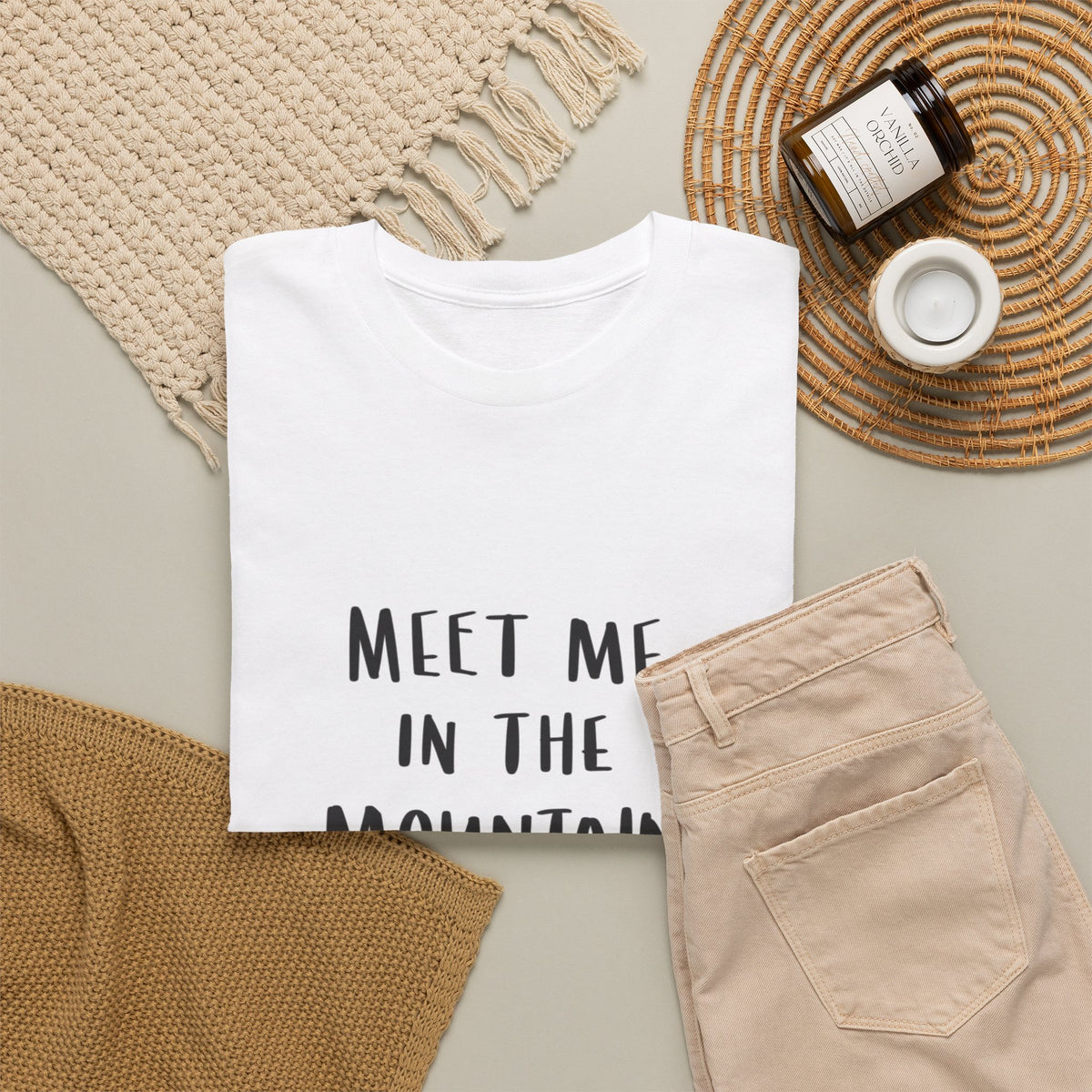 Mountain t-shirt with hand-lettered text 'Meet me in the mountains'